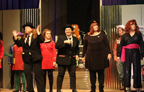 The Blues Brothers, an alien and woman in Starfleet uniforms, the woman in the black sparkly dress, the cowboy, and the woman in the black dress
       and red sash 